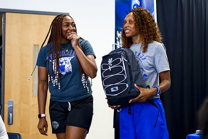 Tionna Herron (right) with head coach Kyra Elzy. (Photo courtesy of University of Kentucky Athletics)